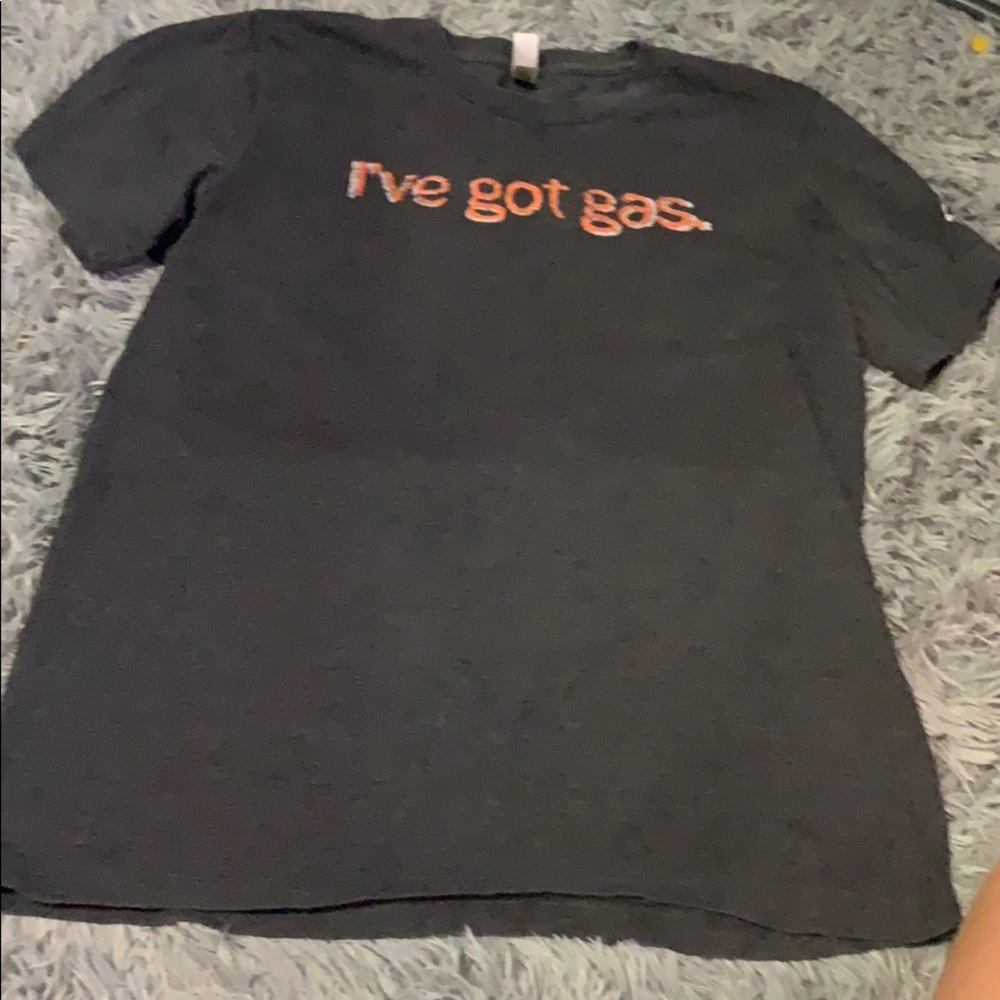 dark gary shirt w “i’ve got gas.” on the front